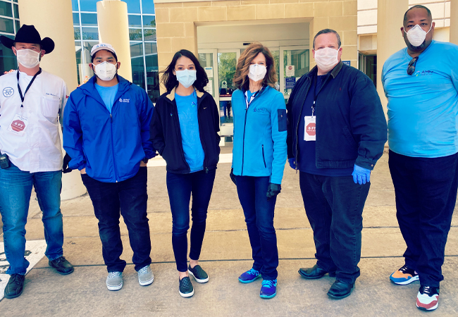 Nurses and physicians standing together