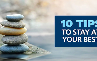 Stacked stones with text "10 Tips to Stay at Your Best" Stacked stones with text "10 Tips to Stay at Your Best"