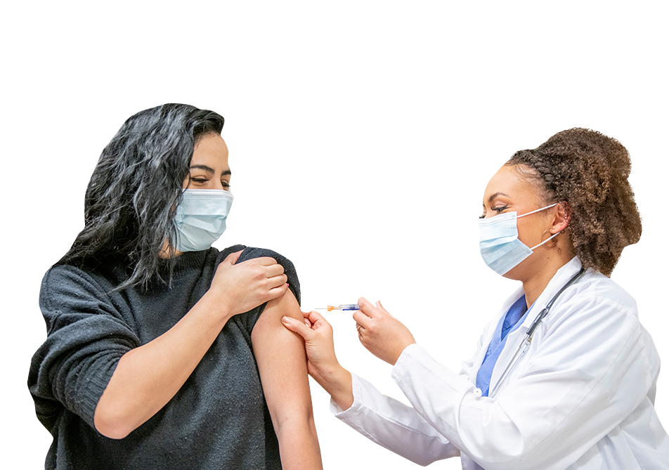 Doctor administering vaccine to patient
