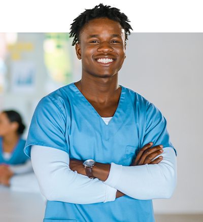 Nurse wearing medical scrubs while smiling Nurse wearing medical scrubs while smiling