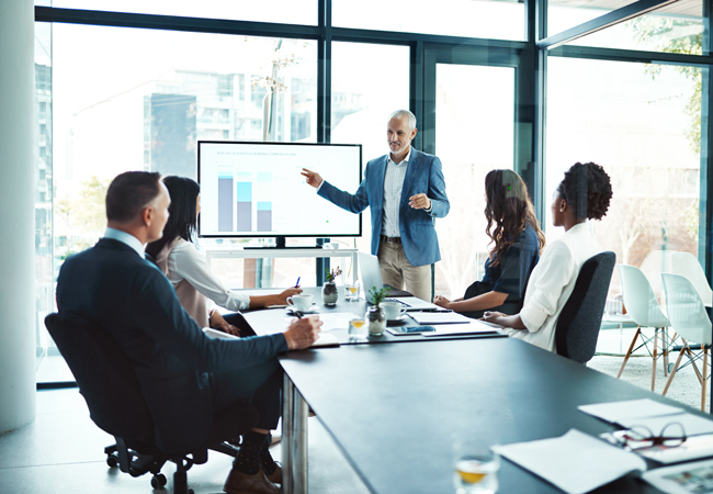 Interim leader giving presentation in meeting
