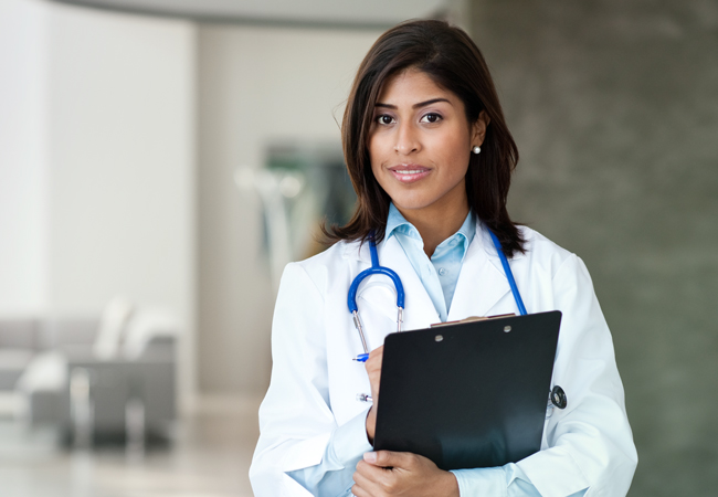 Female physician with clipboard