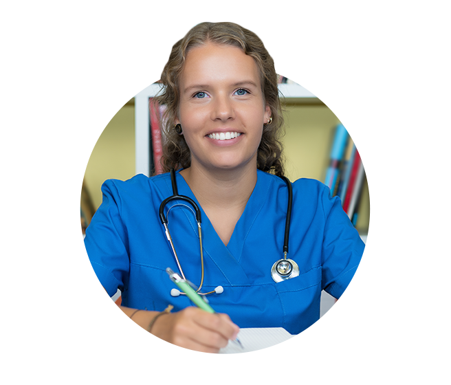 Female school nurse writing on paper