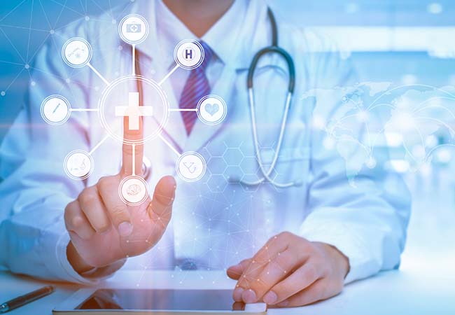 Physician touching screen with digital overlay