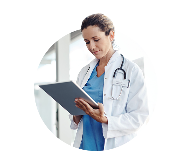 Woman reading her tablet and analyzing her patients' file. 